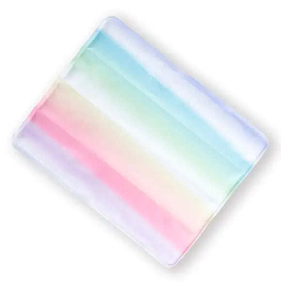 A multicolored pet ice mat with a gradient of blue, pink, and green stripes.