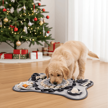 A fluffy golden puppy enjoying the Interactive Puppy Play Mat by ModPets, engaging with hidden treats, beside a beautifully decorated Christmas tree, showcasing the mat's soft fleece design and vibrant flower patterns as a luxurious playtime experience.