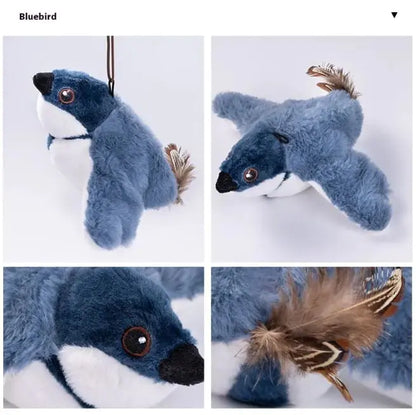 Blue plush toy with feather details on a white background